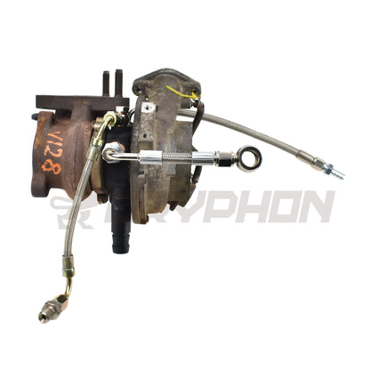 Turbo oil feed line kit for Nissan Cabstar F24M / F24W YD25DDTI with RHF4 VN4 turbocharger, includes 4AN PTFE stainless braided hose and CNC fittings for OEM replacement.